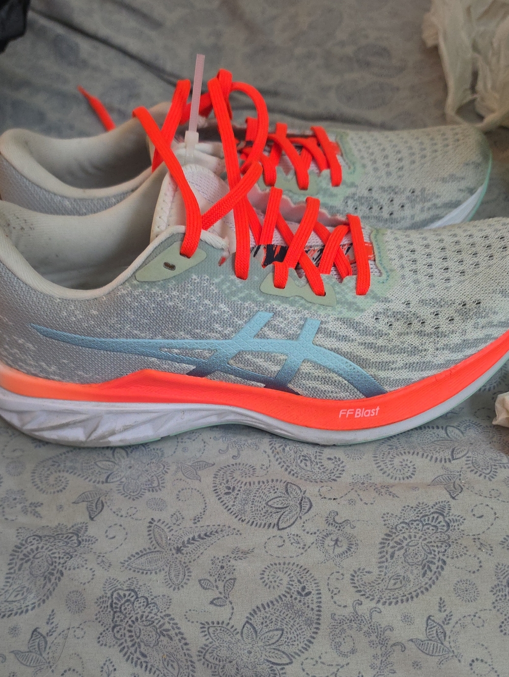 Asics Women's Light Gray Running Shoes with Neon Orange Accents